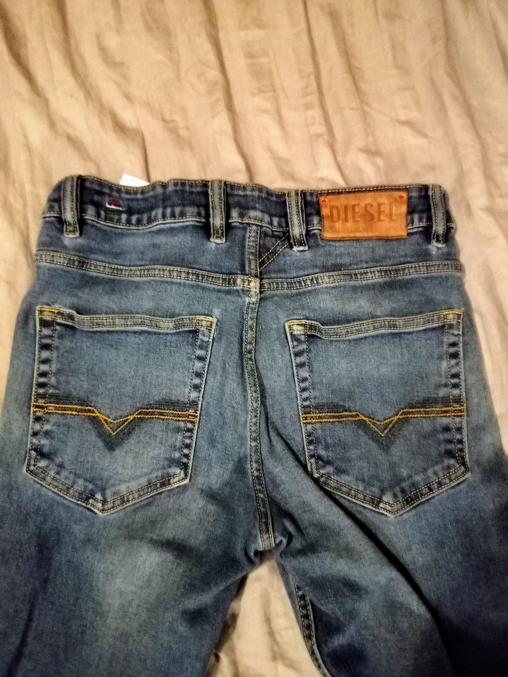Diesel Men's Blue Denim Jeans - Classic Back Pocket Design